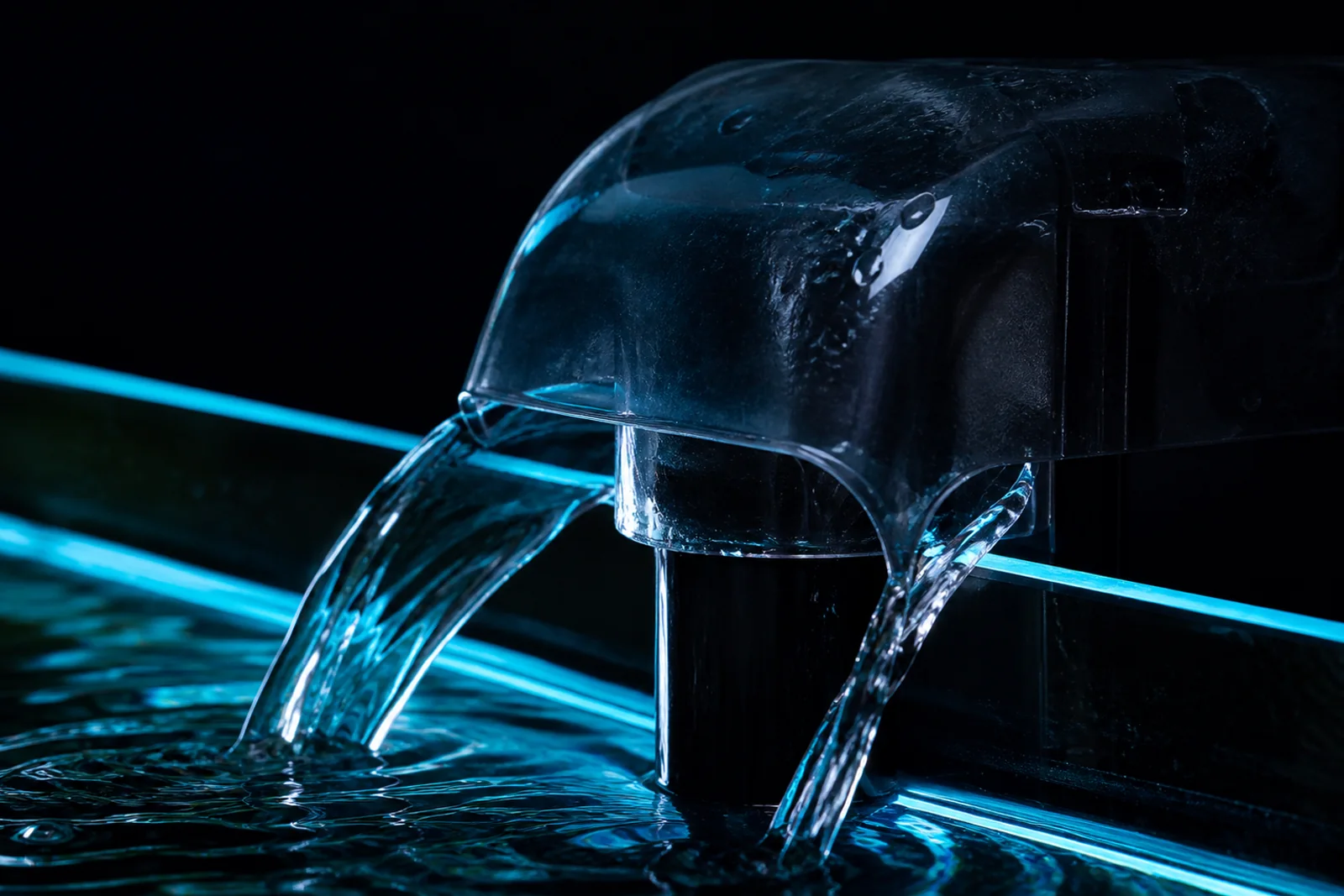 A cut plastic bottle fitted over an aquarium filter outflow to spread the returning water